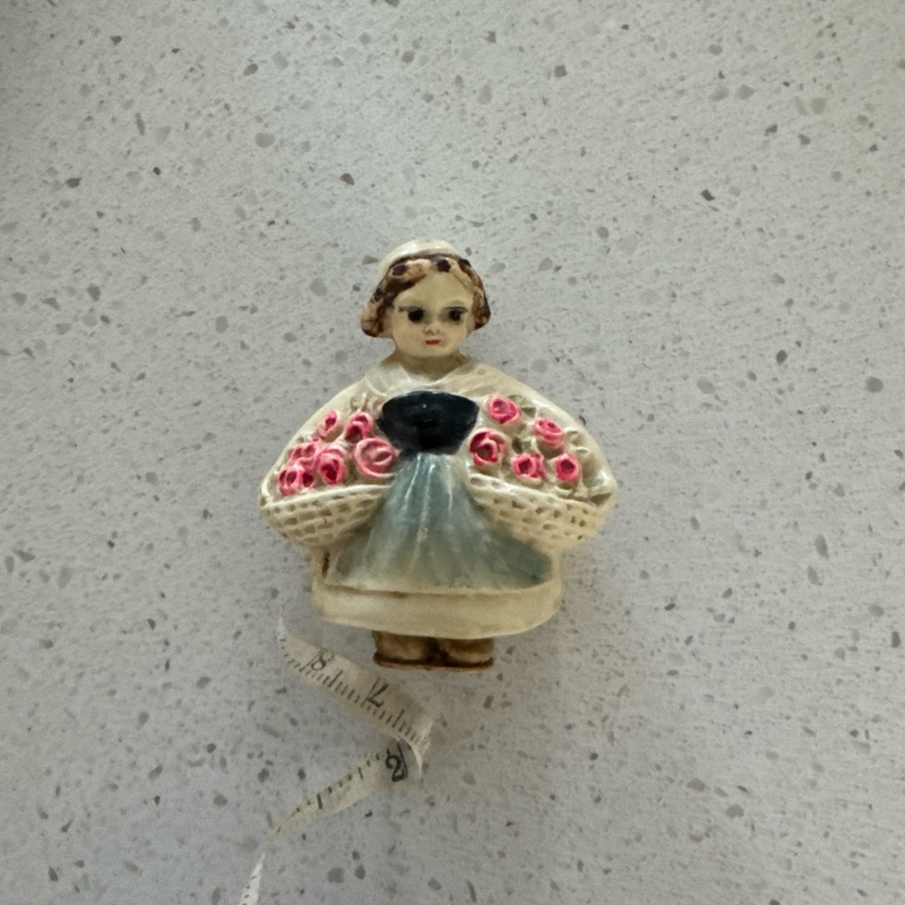Antique Tape Measure Woman with Flowers Celluloid Figural